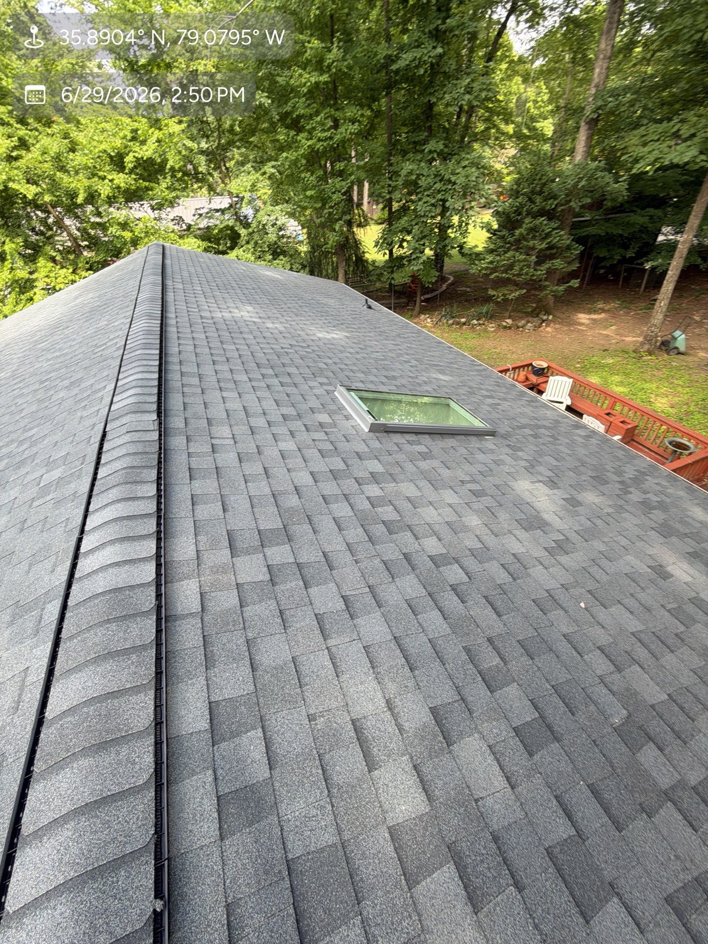 After — new architectural shingles and ridge vent