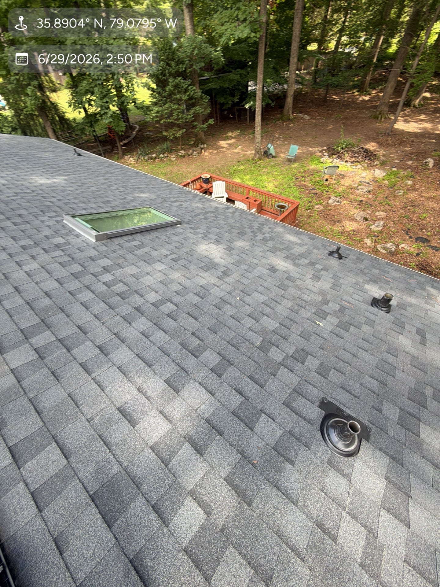 After — fresh roof with new skylight and pipe boots