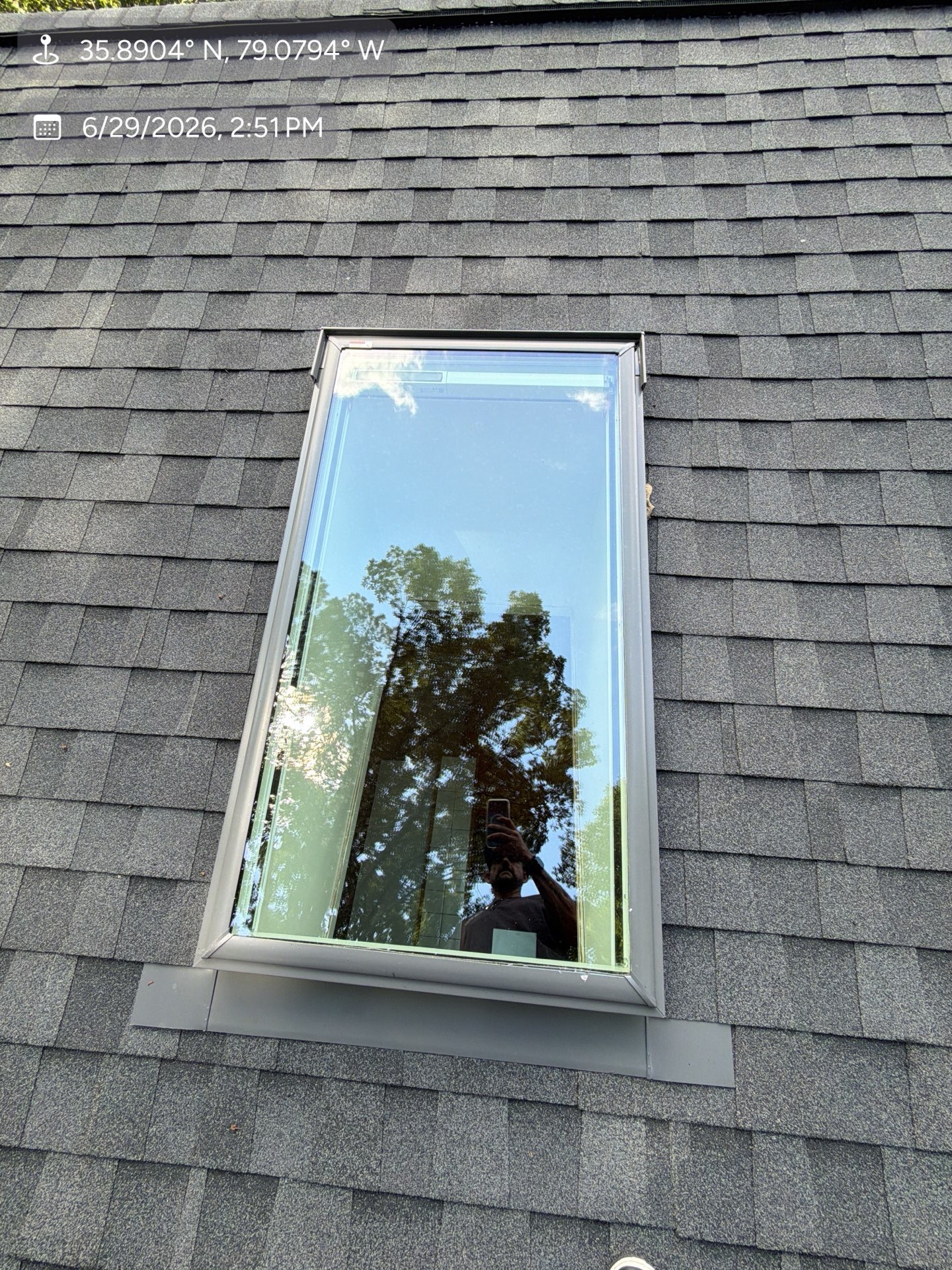 After — brand new skylight installed flush with new shingles